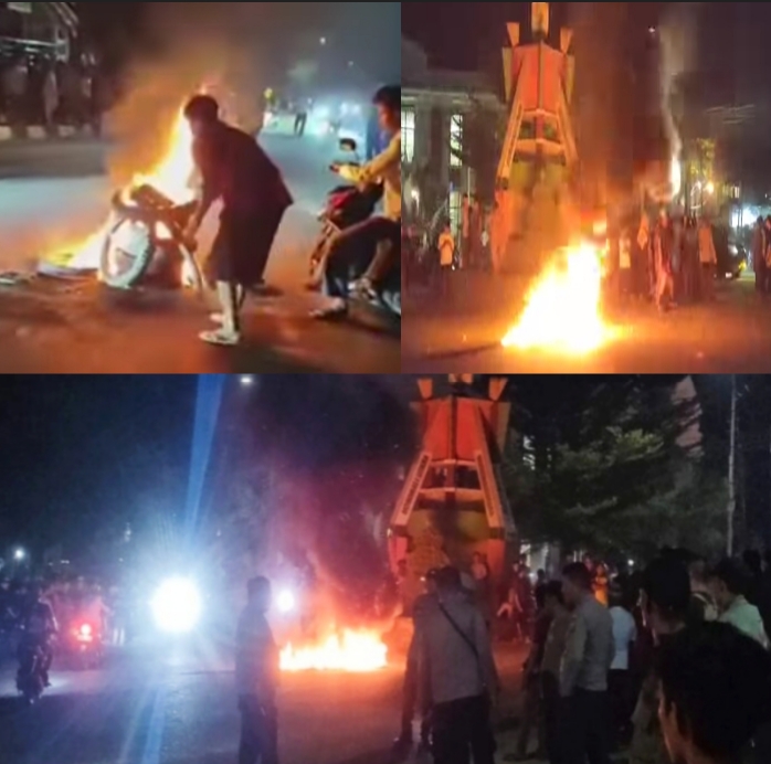 Ratusan massa turun ke jalan hingga bakar ban di depan Rumah Jabatan Bupati  Morowali Utara, Sabtu malam (01/03/2025).